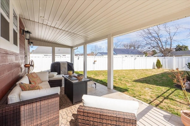 view of patio / terrace featuring outdoor lounge area, a fenced backyard, and grilling area