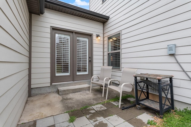 entrance to property featuring a patio area