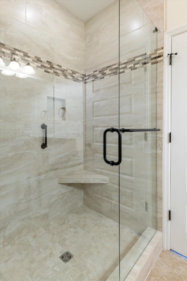 full bath featuring a stall shower