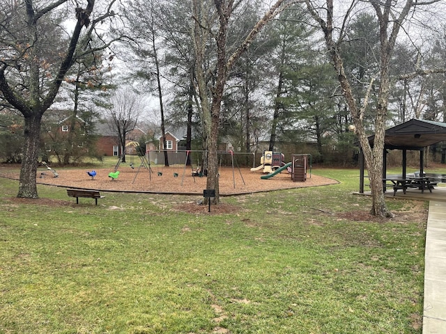 exterior space with a gazebo, playground community, and a yard