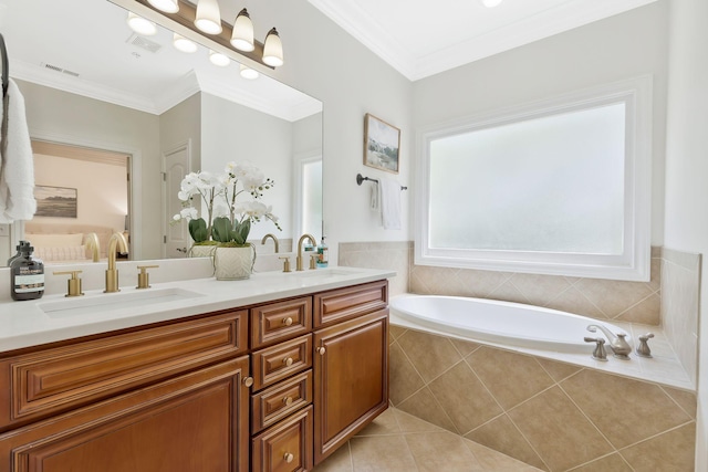 full bath with crown molding, visible vents, a sink, and tile patterned floors