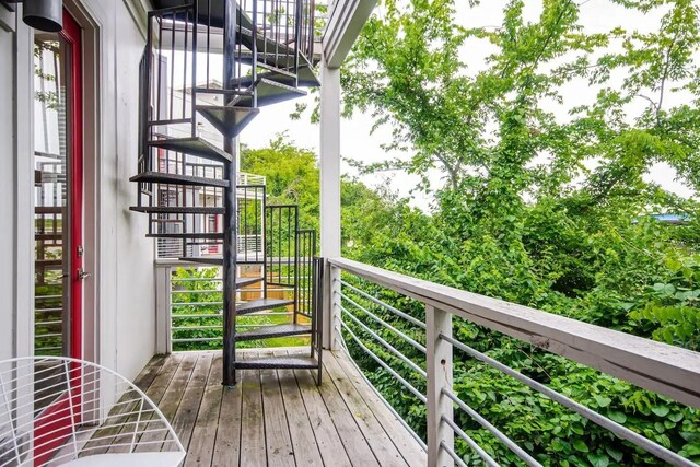 balcony featuring stairs