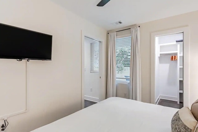 bedroom with visible vents and a ceiling fan