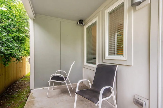 view of patio / terrace featuring fence