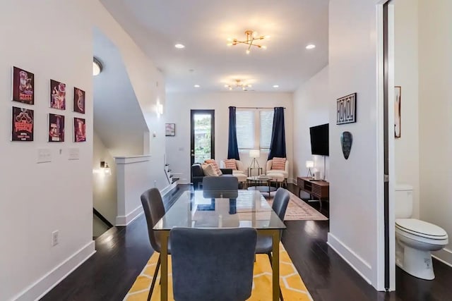 dining room with recessed lighting, wood finished floors, and baseboards