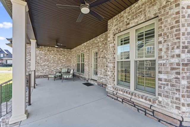 view of patio featuring a porch and a ceiling fan