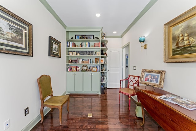 sitting room featuring ornamental molding, recessed lighting, baseboards, and wood finished floors