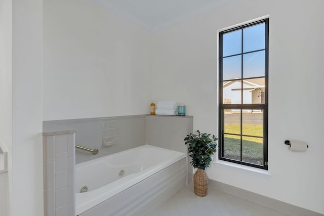 full bath with a whirlpool tub and crown molding