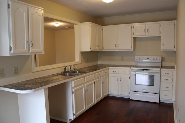 kitchen featuring dark countertops, electric range, dark wood-type flooring, white cabinetry, and a sink