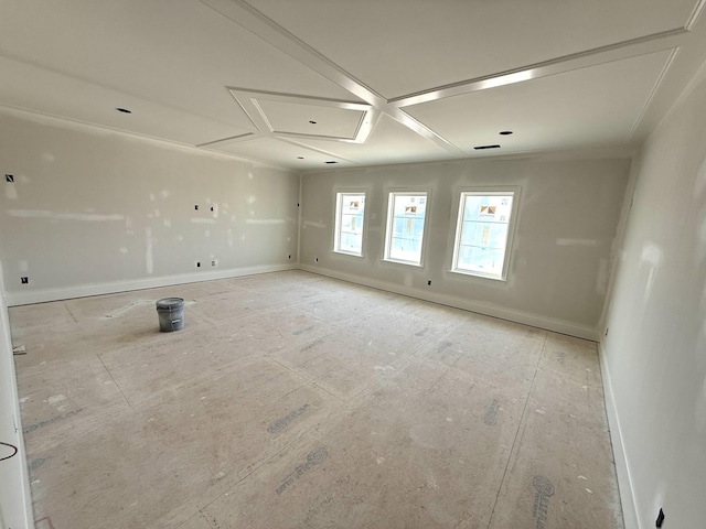 unfurnished room featuring baseboards