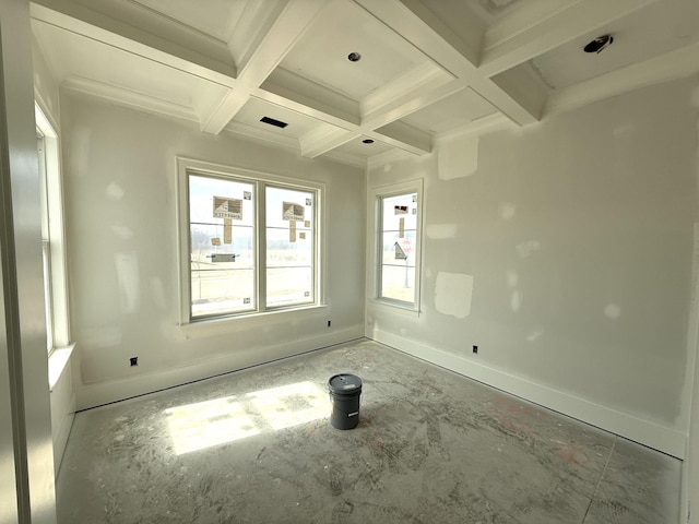 empty room featuring beamed ceiling, coffered ceiling, and baseboards