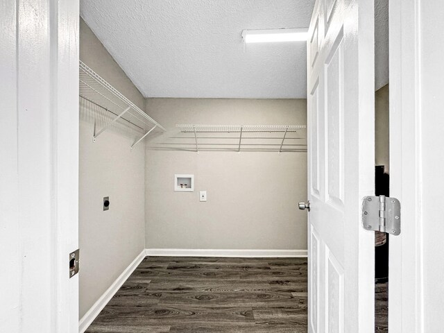 laundry room with laundry area, washer hookup, baseboards, dark wood finished floors, and electric dryer hookup