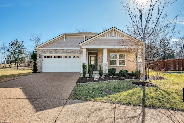 craftsman inspired home with an attached garage, brick siding, fence, concrete driveway, and a front lawn