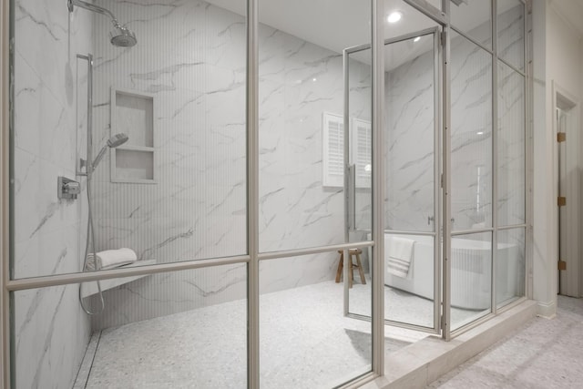 full bath featuring a marble finish shower and recessed lighting