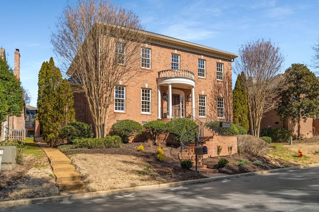 view of front of property featuring brick siding