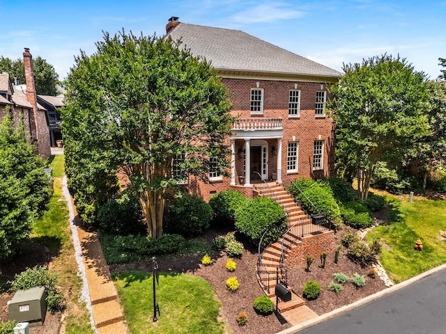 53 Whitworth Blvd, Nashville, TN 37205 - colonial house featuring brick siding, stairway, and a chimney