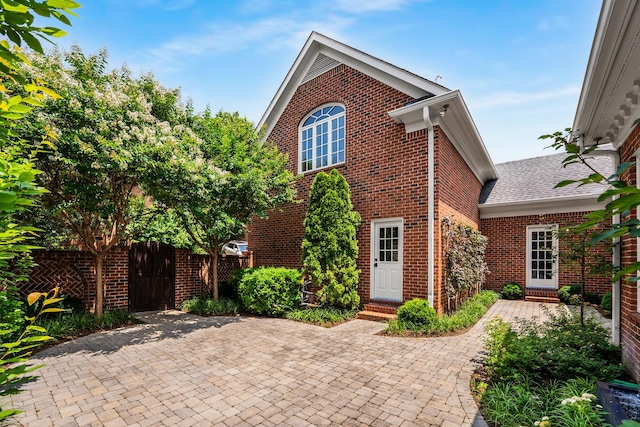 53 Whitworth Blvd, Nashville, TN 37205 - view of front facade featuring brick siding, a patio area, and entry steps