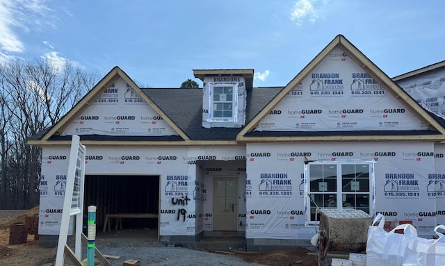 property under construction with an attached garage