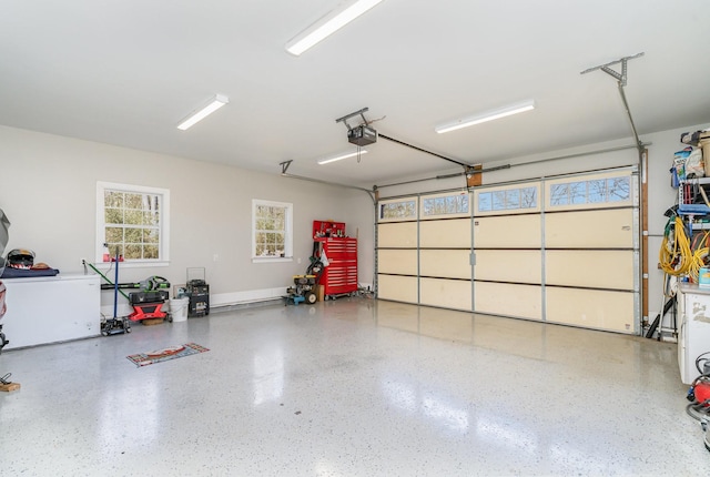 garage featuring a garage door opener