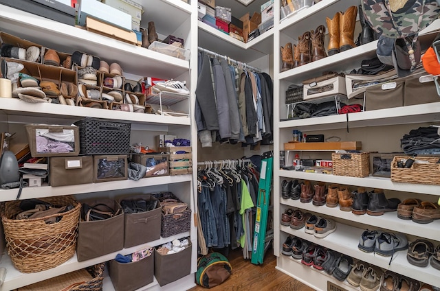 spacious closet featuring wood finished floors