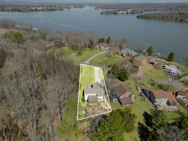 bird's eye view with a water view and a residential view