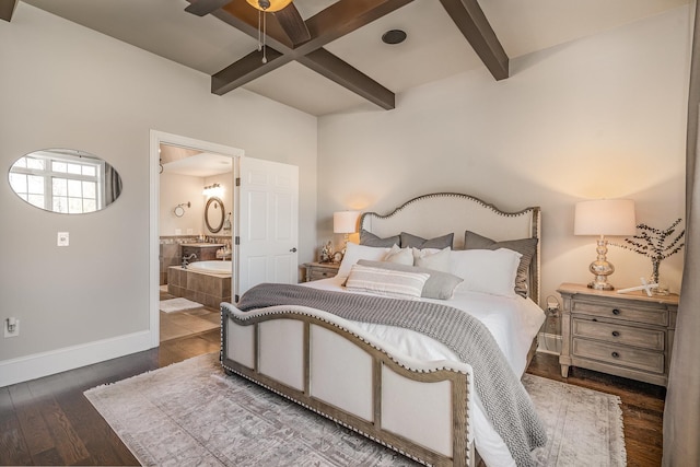 bedroom with connected bathroom, coffered ceiling, wood finished floors, baseboards, and beamed ceiling