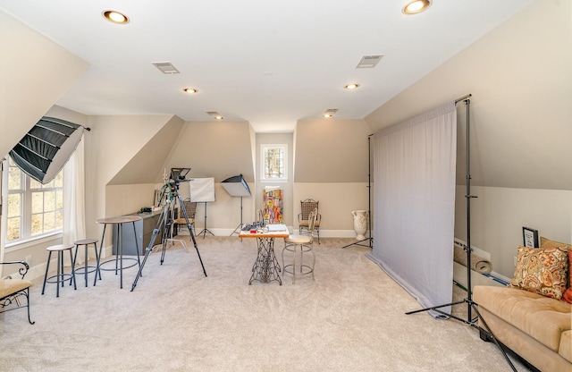 playroom with a healthy amount of sunlight, visible vents, and carpet flooring