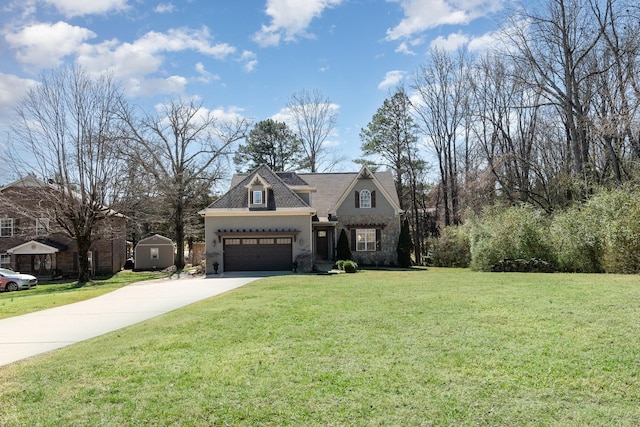 traditional-style home featuring driveway, stone siding, a garage, and a front yard