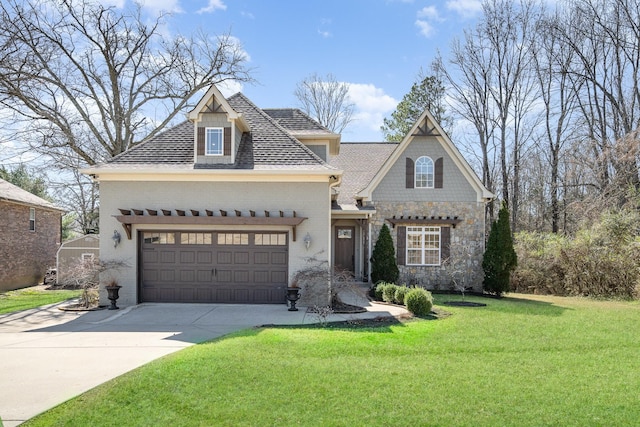 view of front of home featuring an attached garage, stone siding, a front lawn, and concrete driveway