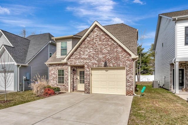 view of front of home with brick siding, roof with shingles, concrete driveway, a garage, and cooling unit