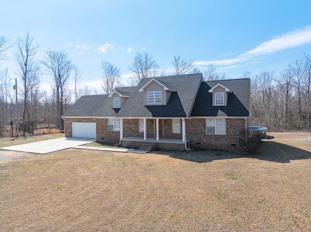 view of front of home featuring brick siding, a porch, crawl space, driveway, and a front lawn