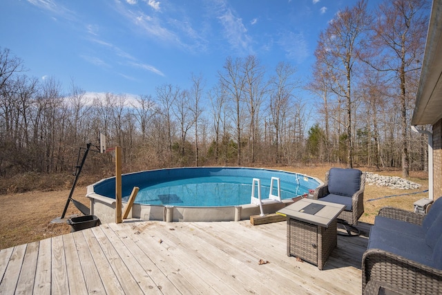 pool with a wooden deck