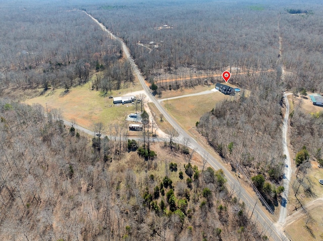 aerial view with a rural view and a view of trees