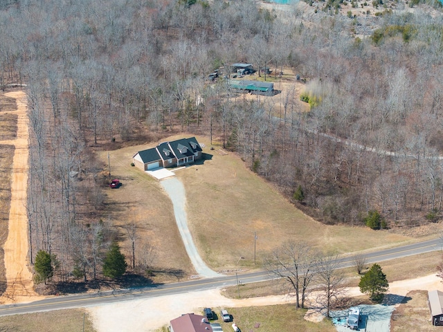 bird's eye view featuring a forest view