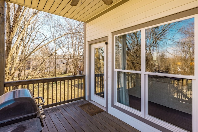 wooden deck featuring grilling area