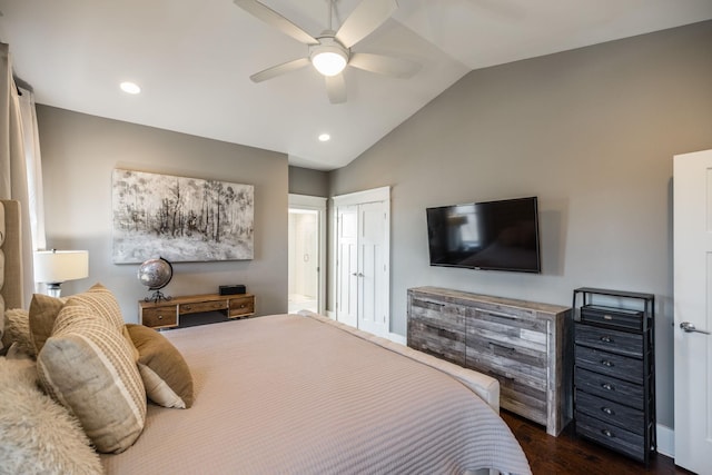 bedroom featuring lofted ceiling, a closet, recessed lighting, dark wood-type flooring, and a ceiling fan