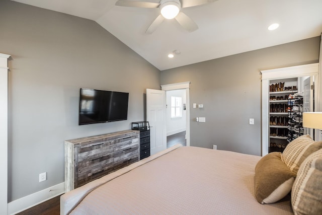 bedroom featuring recessed lighting, a ceiling fan, baseboards, vaulted ceiling, and dark wood finished floors