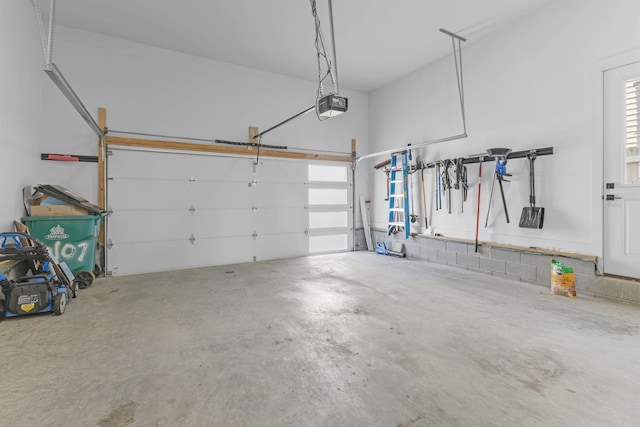 garage featuring a garage door opener