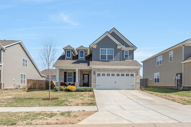 view of front facade featuring a porch, a garage, brick siding, driveway, and a front lawn