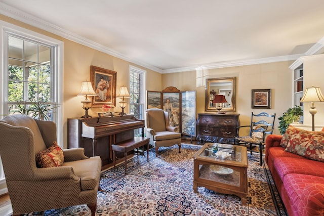 living room with a wealth of natural light, crown molding, and wood finished floors