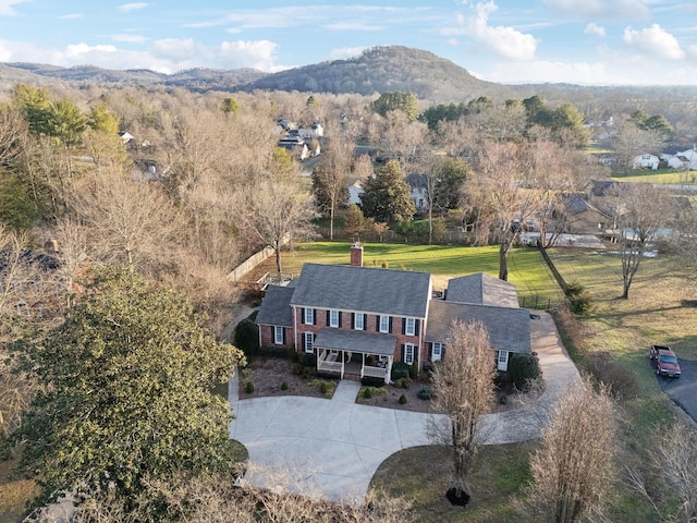 birds eye view of property with a mountain view