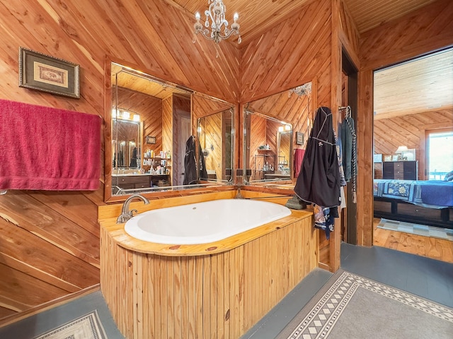 full bath with wood ceiling, a garden tub, wooden walls, and an inviting chandelier