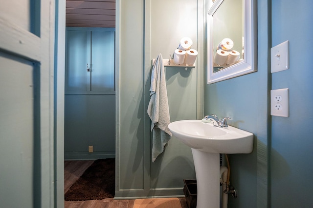 bathroom featuring a sink and wood finished floors