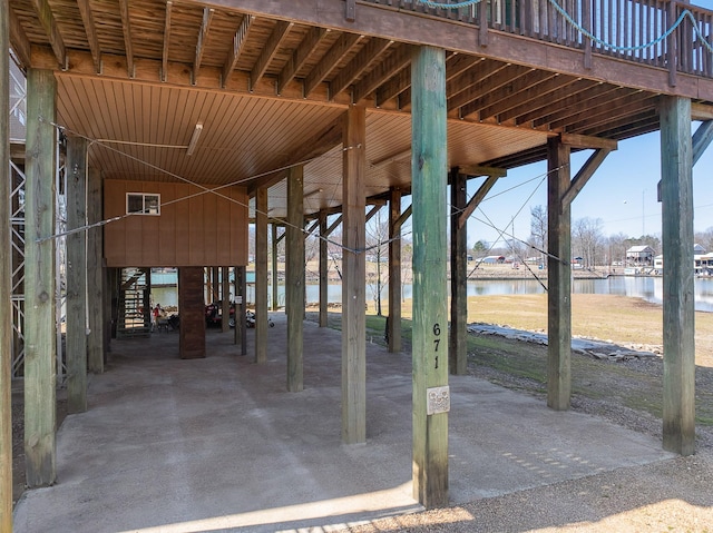 view of patio with a water view