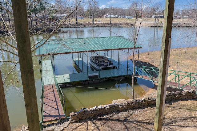 dock area with a water view