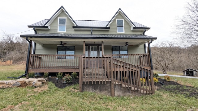 view of front of property with a porch, metal roof, and a ceiling fan