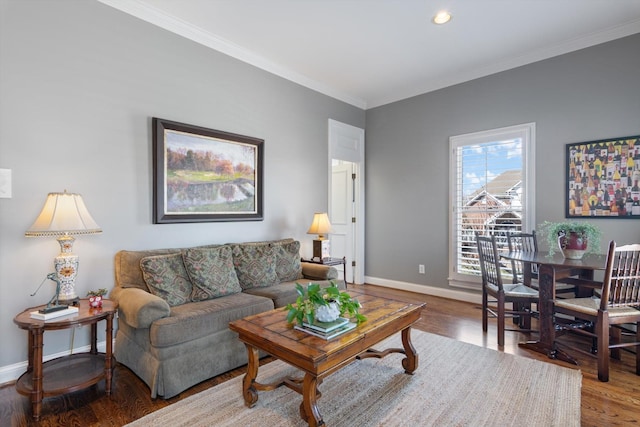 living area with recessed lighting, baseboards, crown molding, and wood finished floors