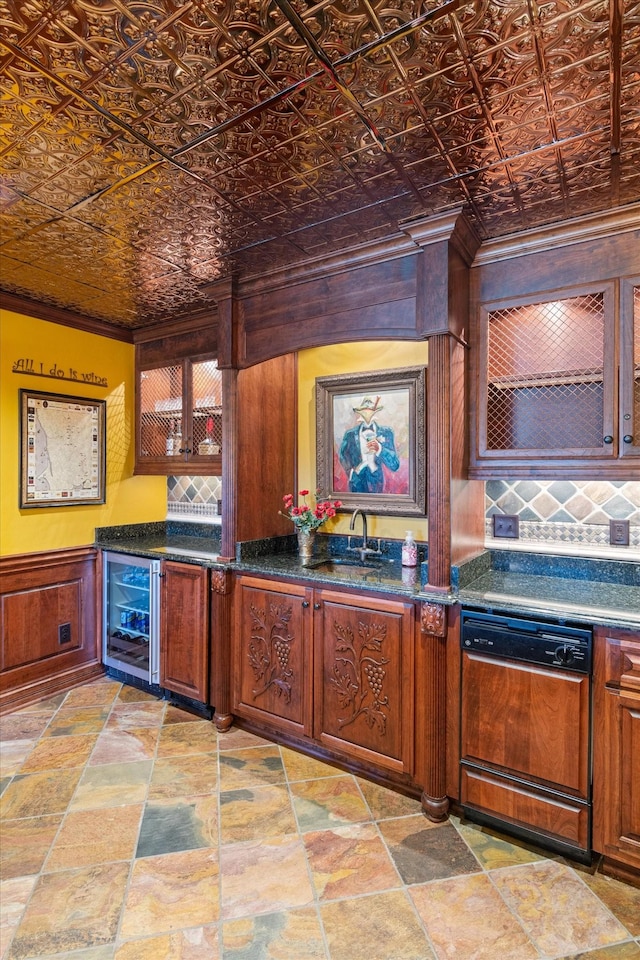 interior space with beverage cooler, ornamental molding, an ornate ceiling, and dishwasher