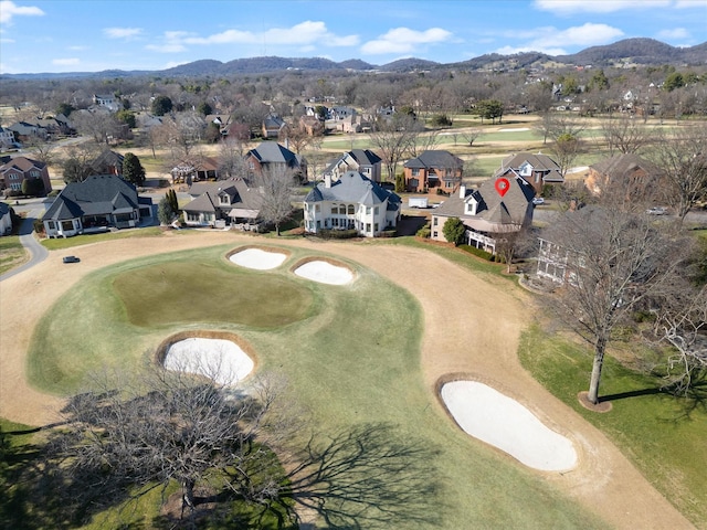 birds eye view of property featuring a mountain view, golf course view, and a residential view