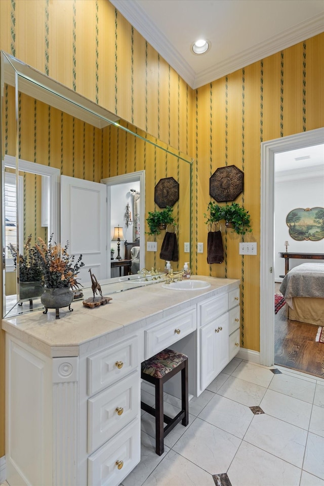 ensuite bathroom with wallpapered walls, ensuite bath, tile patterned floors, crown molding, and vanity